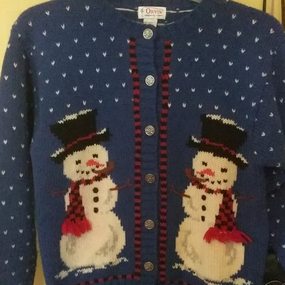 Adorable winter sweater. Made by Orvis size large.